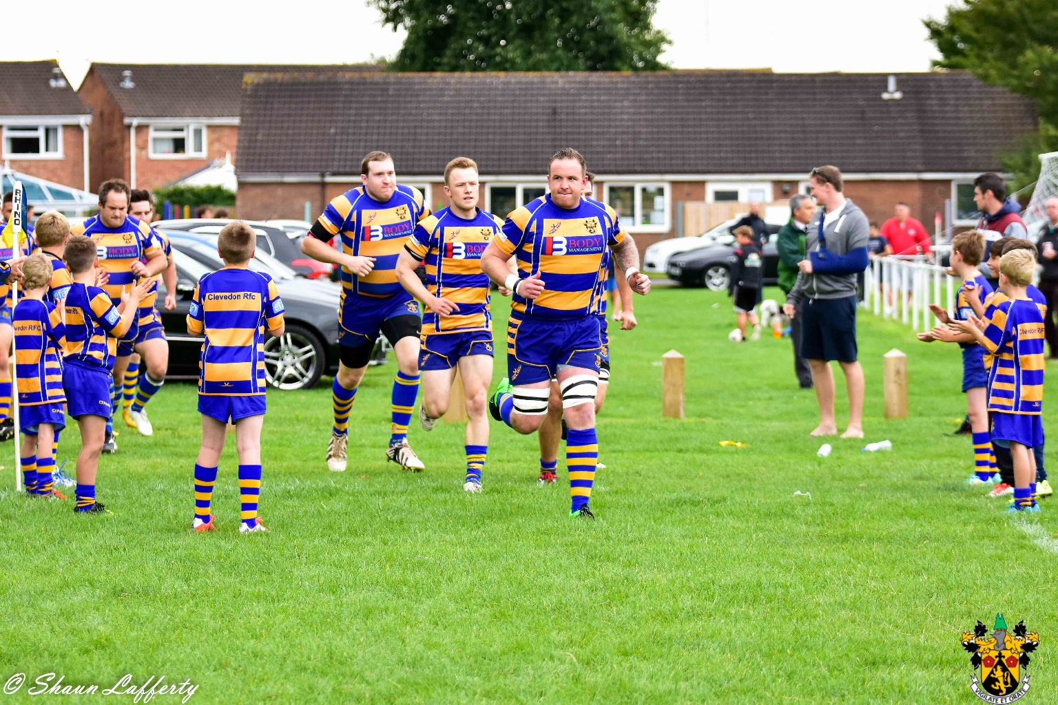 Shaun Lafferty: Captain Dave Rawle leads his team out...