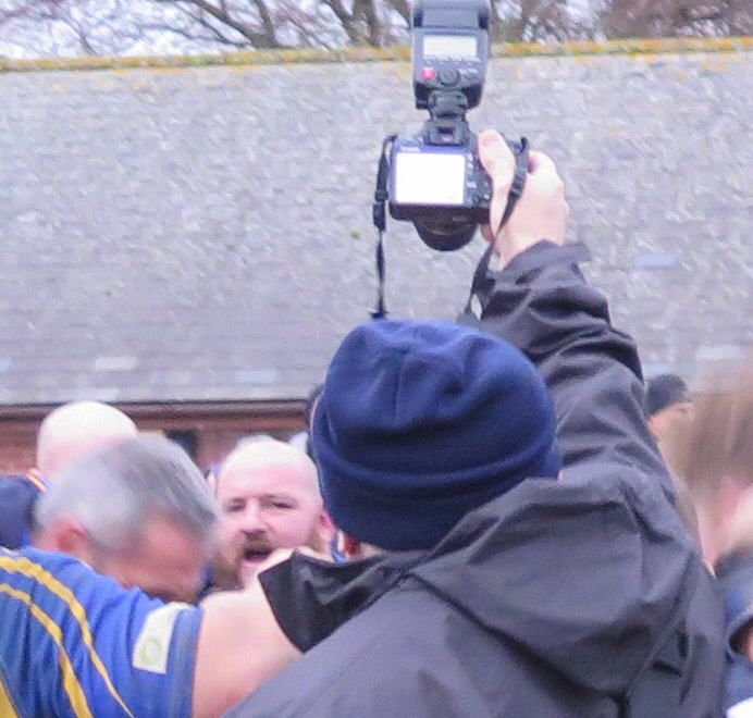 Tucks eyeballs his nemesis...