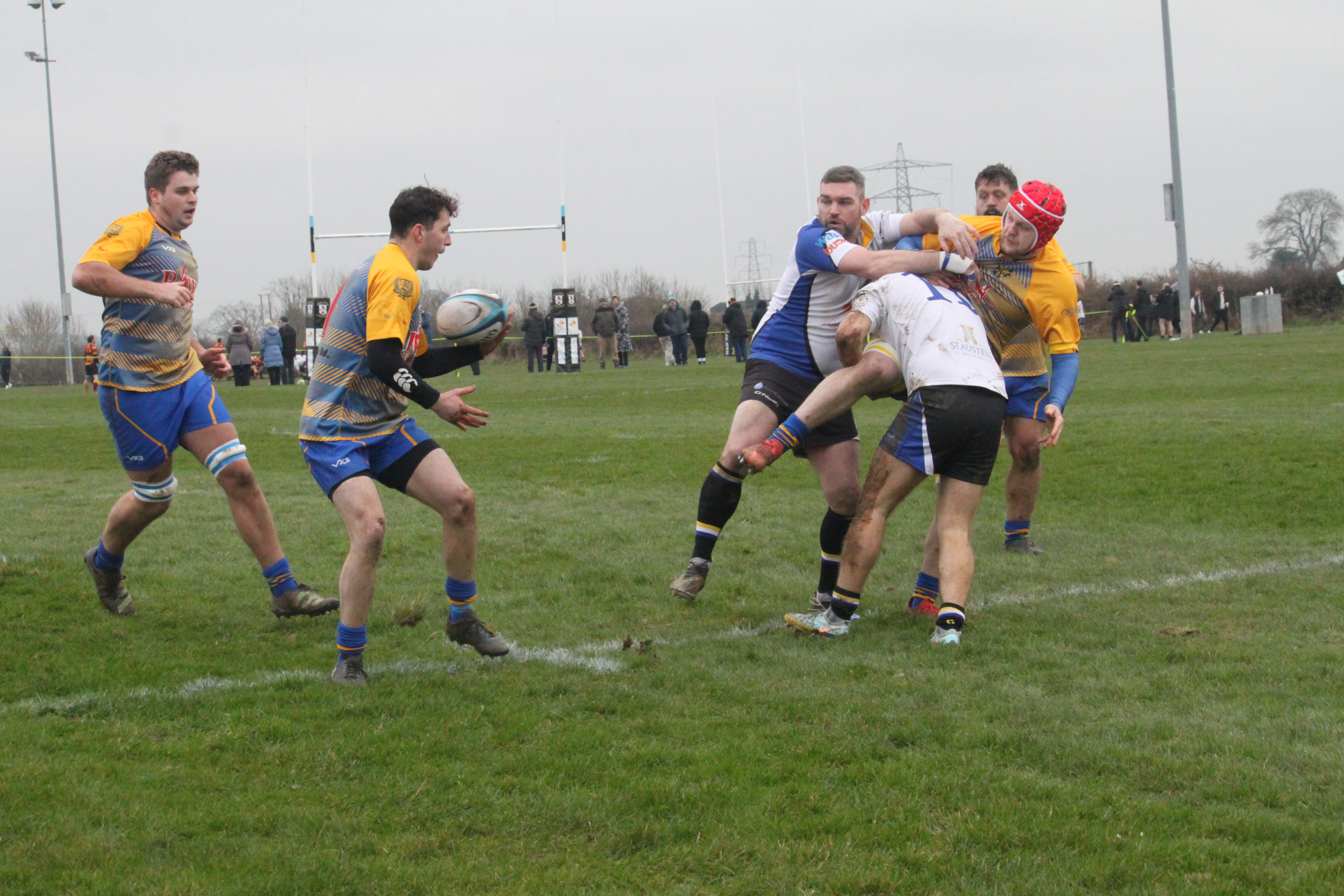 Cal Fear gets the ball away...